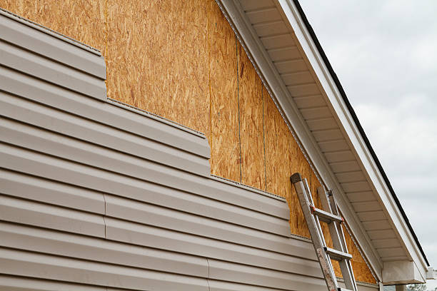 Professional Emergency Siding Repair technician working in Homerville, OH